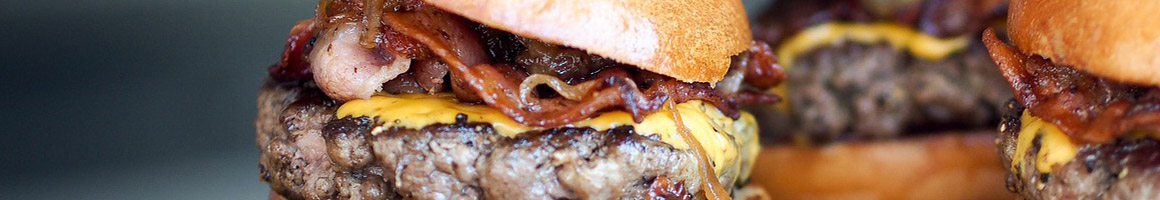 Eating Burger at Burgatory restaurant in Pittsburgh, PA.